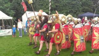 Roman Reenactment at the Amphitheatre in Caerleon Marching In [upl. by Aratehs634]